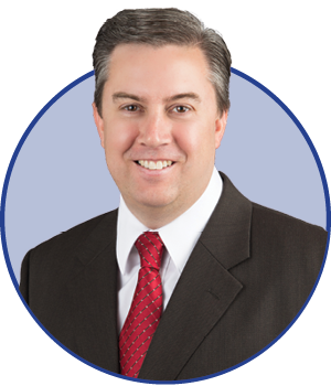 A headshot of Jeffrey Moore of Audiology, Inc.